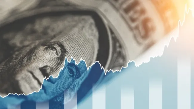 rising graph with dollar bill